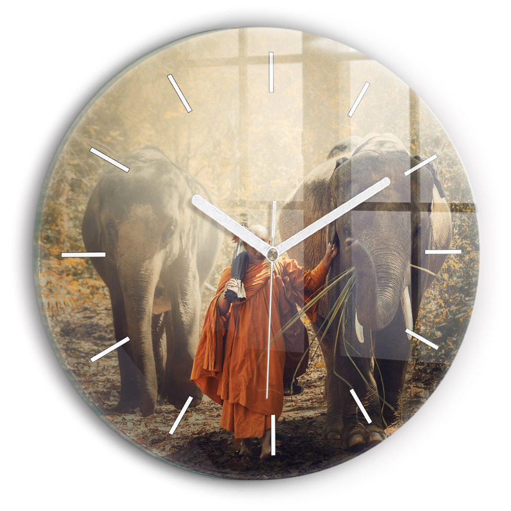 Horloge ronde Moine guidant des éléphants