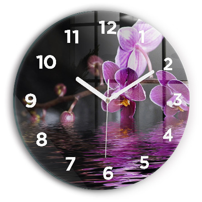 Pendule murale ronde Fleur d'orchidée sur l'eau