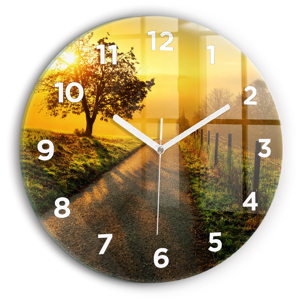Horloge ronde en verre Brume au lever du soleil