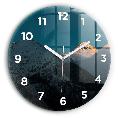 Horloge ronde murale Coucher de soleil dans les montagnes