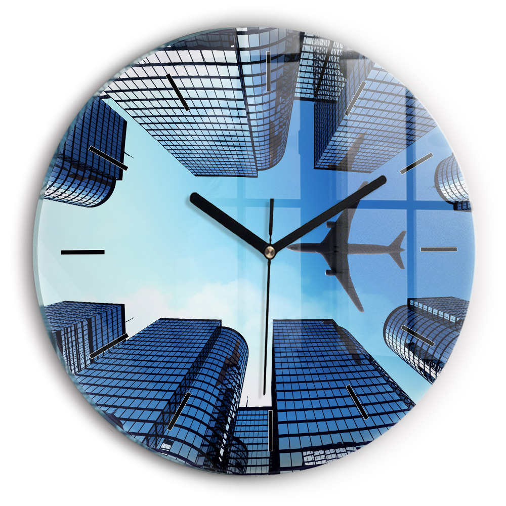 Avion au-dessus de bâtiments Horloge ronde murale