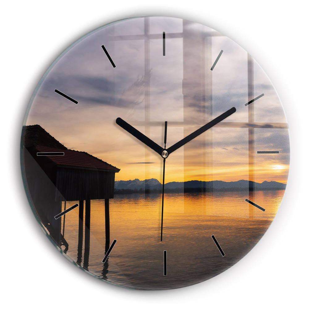 Coucher de soleil sur un lac Horloge ronde