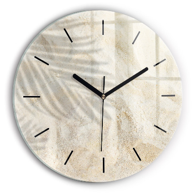 Ombre d'un palmier sur le sable Horloge ronde en verre