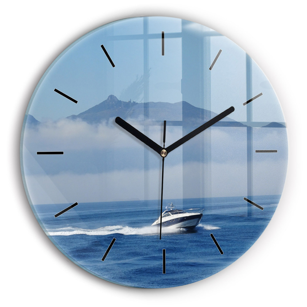 Bateau flottant sur l'océan Horloge ronde en verre