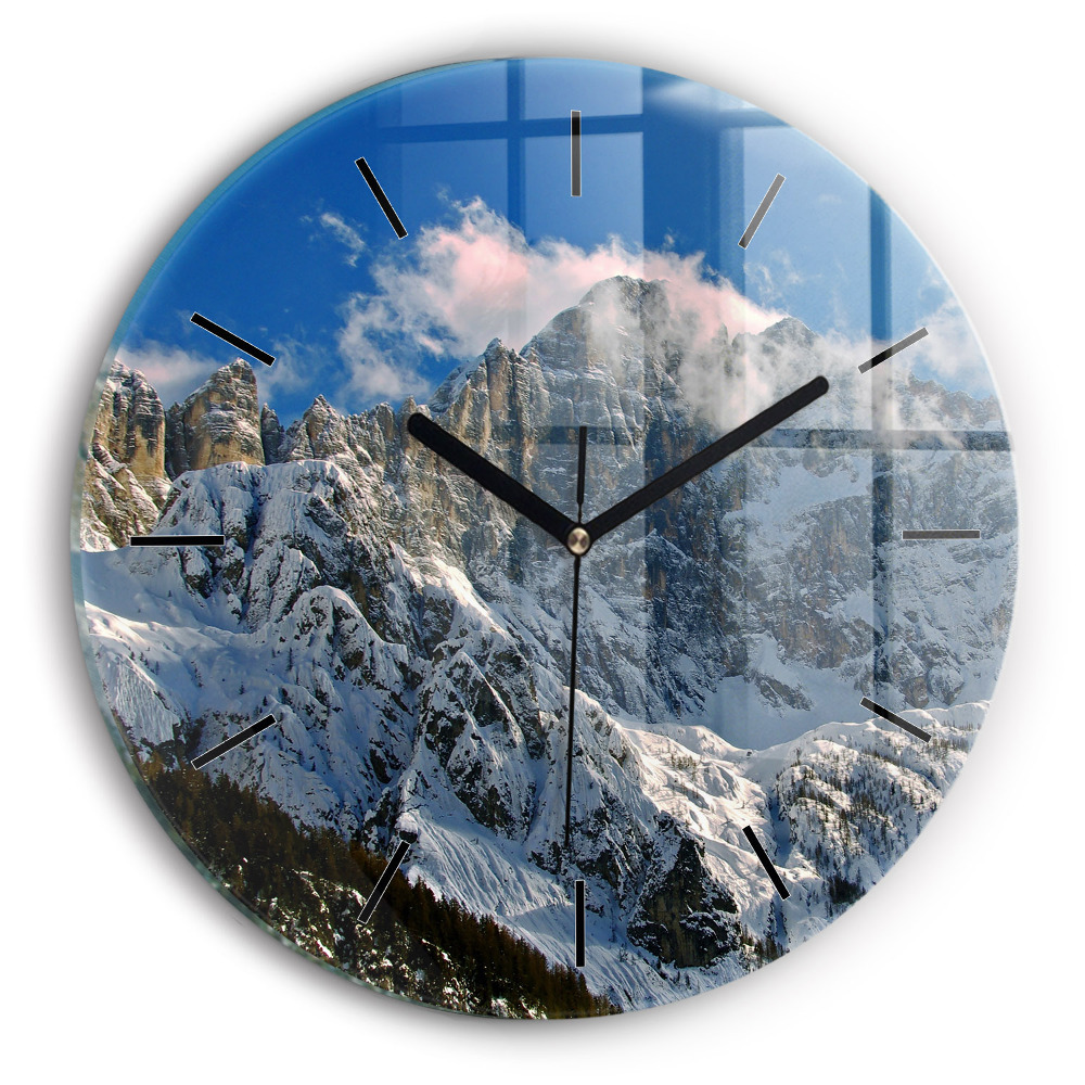 Montagnes sous un ciel bleu Pendule murale ronde