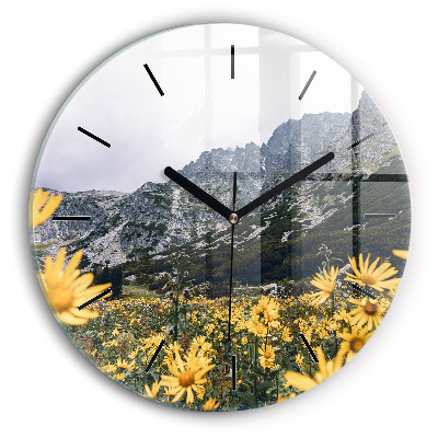 Prairie de fleurs dans les montagnes Horloge ronde