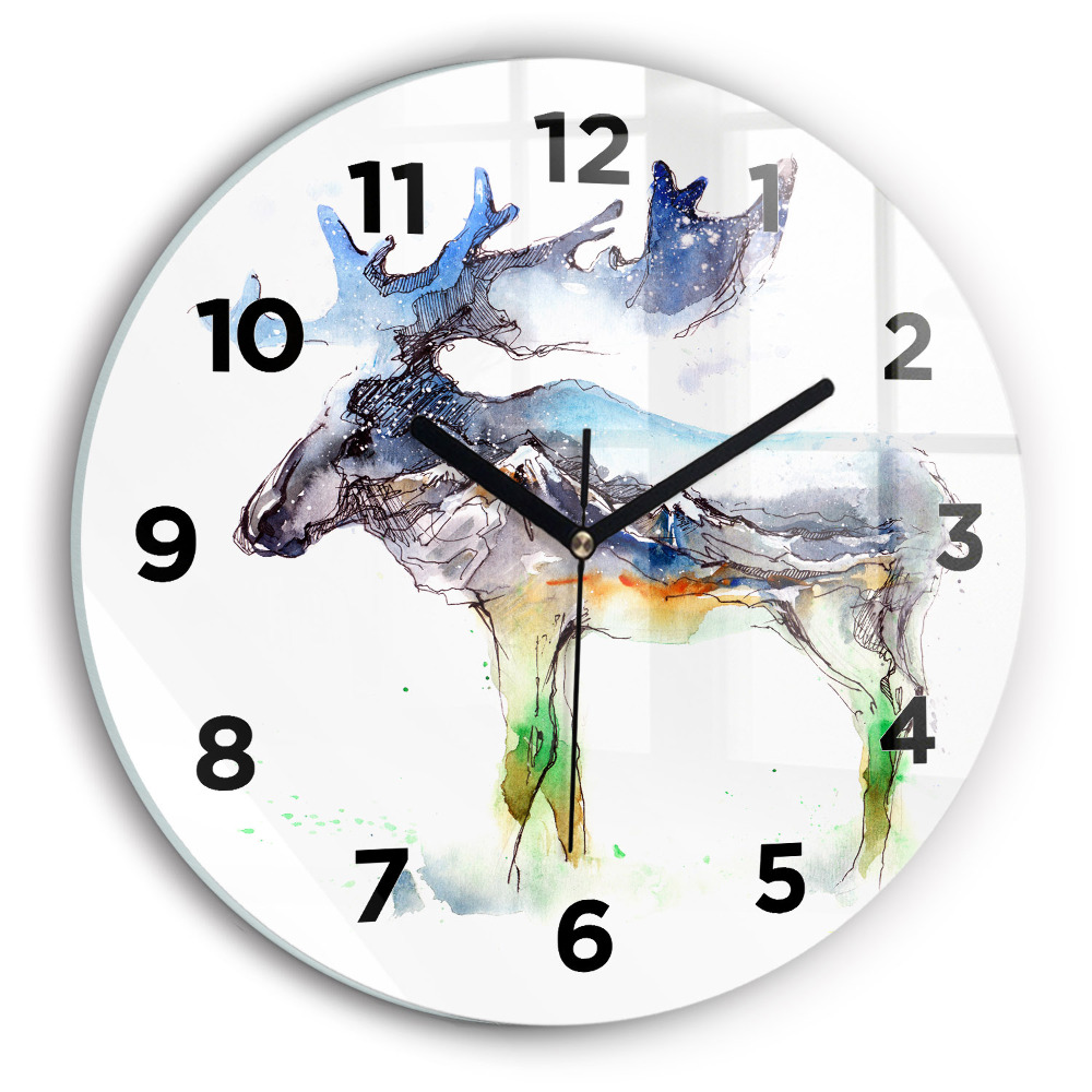 Horloge ronde Orignal et paysage de montagne