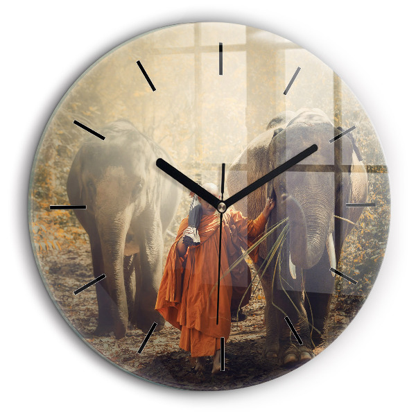 Horloge ronde 60 cm Moine guidant des éléphants